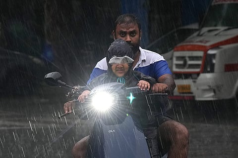 Commuters get drenched during rains in Delhi